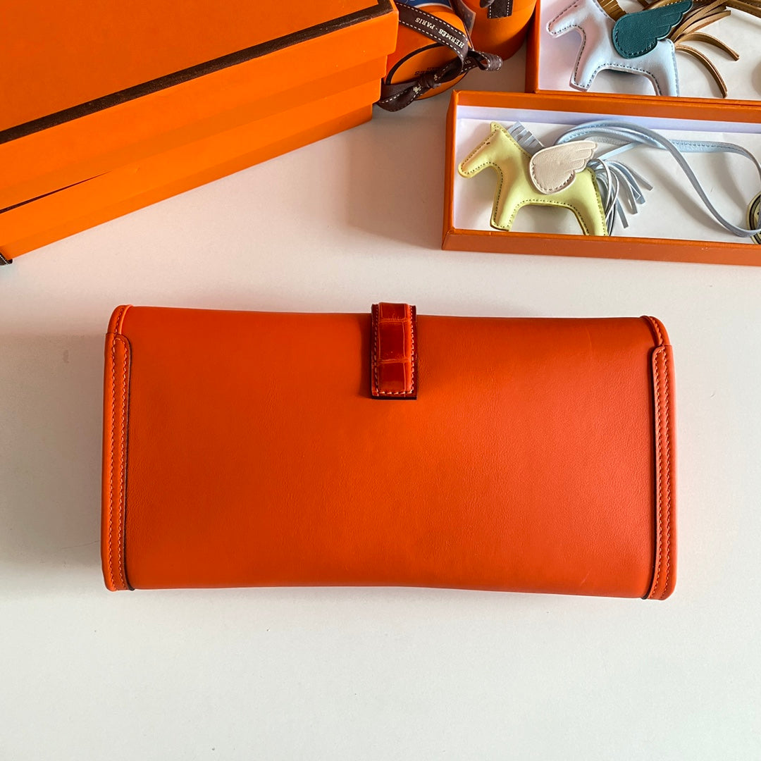 HERMES JIGE ELAN 29 CLUTCH IN BRIGHT ORANGE CALFSKIN WITH LIZARD SKIN