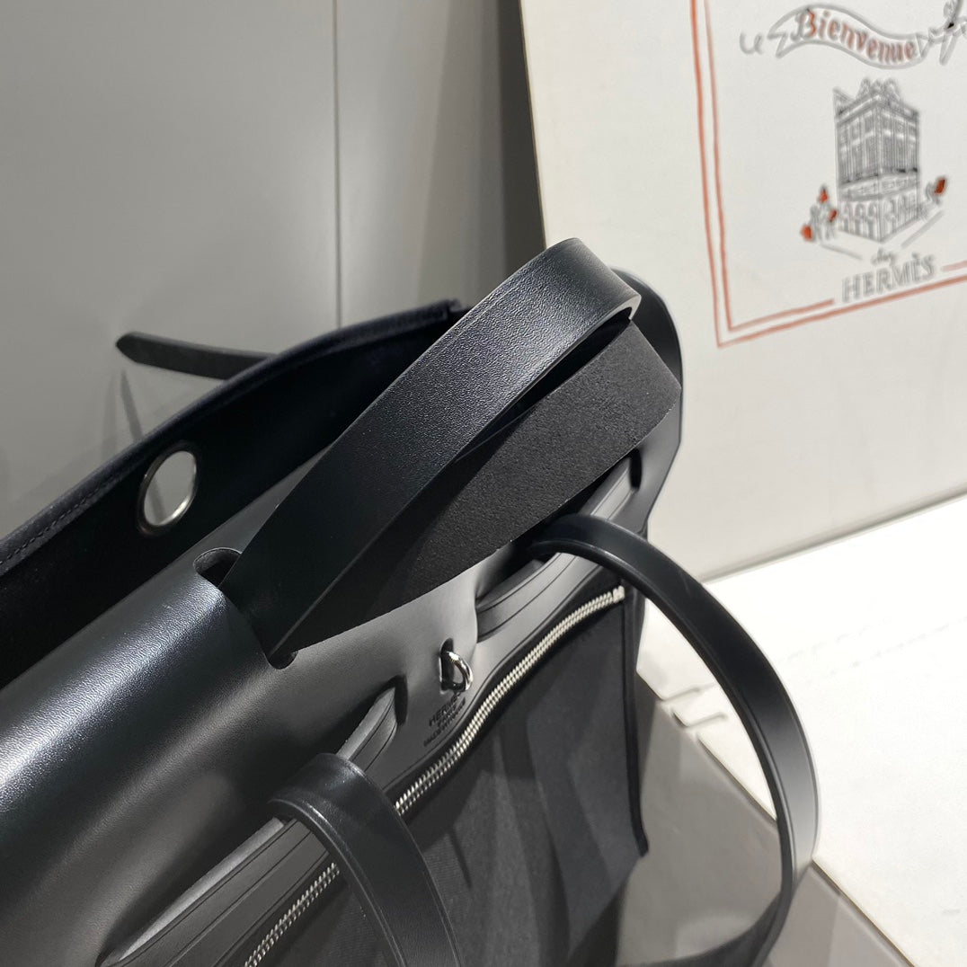 HERMES HERBAG A DOS ZIP RETOURNE BACKPACK 29 IN BLACK CANVAS AND CALFSKIN
