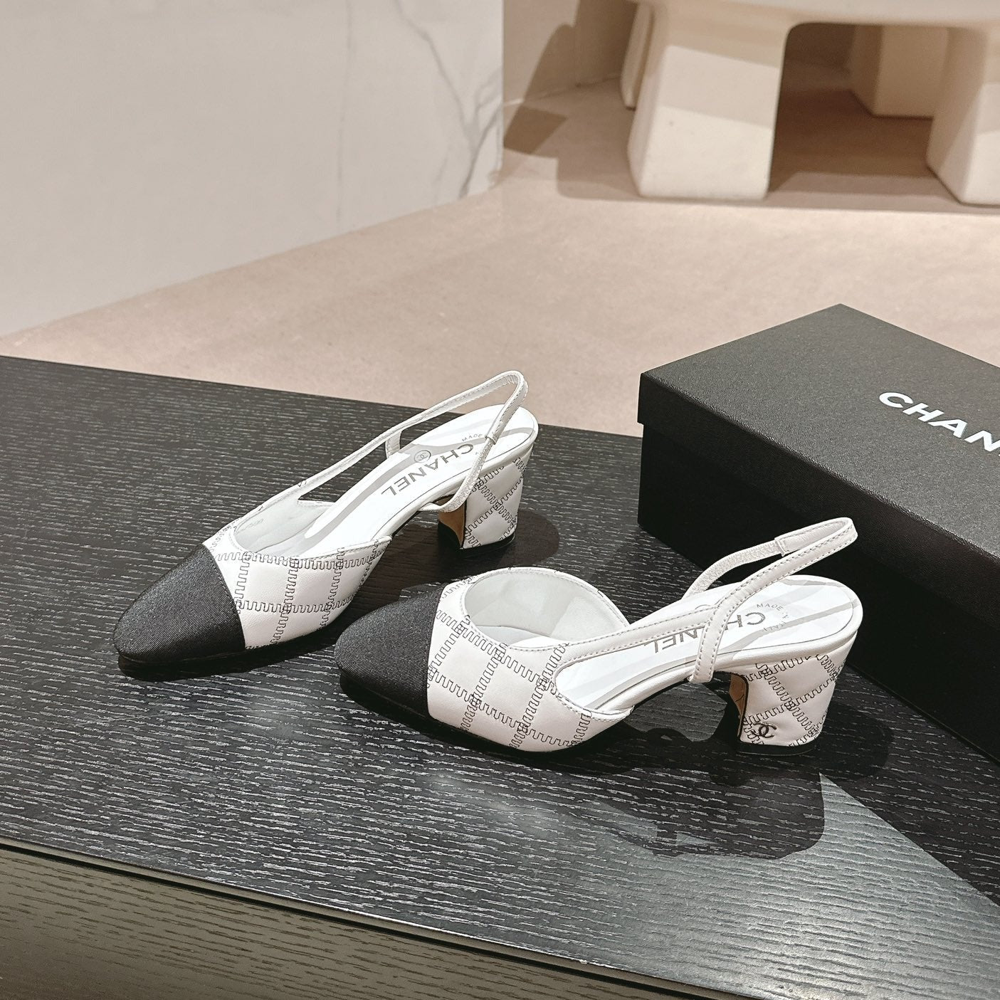 CHANEL HIGH SLINGBACKS IN WHITE LAMBSKIN AND BLACK SATIN