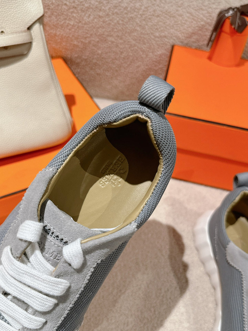 HERMES MAINLAND SNEAKER IN ASH GRAY SUEDE AND SHARK GRAY BREATHABLE MESH FABRIC