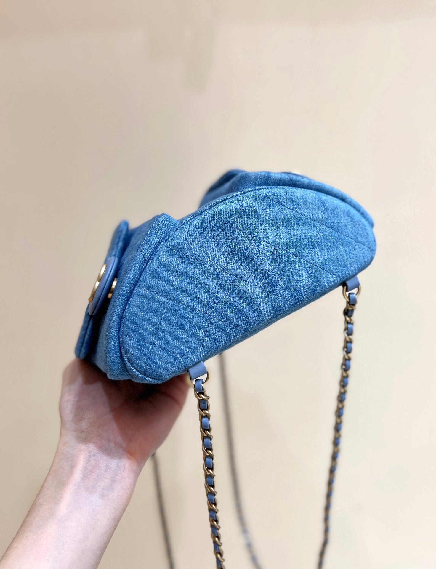 CHANEL DRAWSTRING BUCKET BACKPACK 24 IN MALIBU BLUE DENIM GOLD HARDWARE