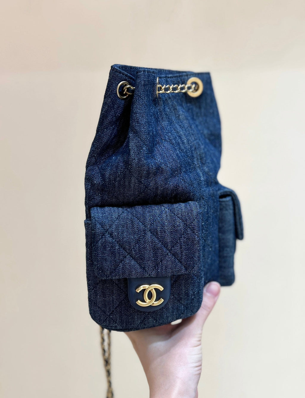 CHANEL DRAWSTRING BUCKET BACKPACK 24 IN DARK BLUE DENIM GOLD HARDWARE